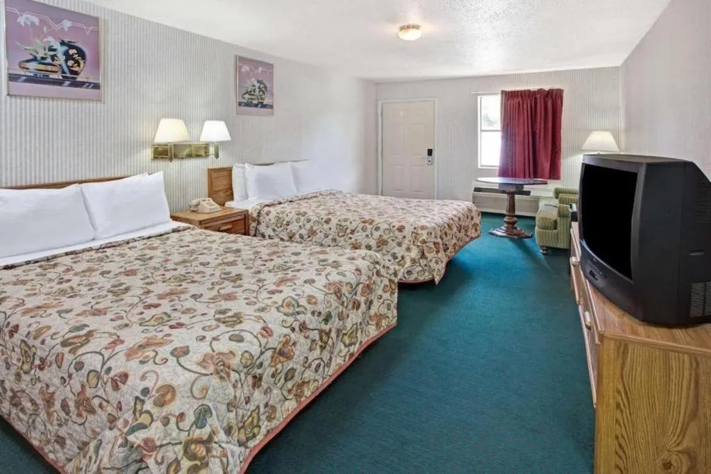 Bed in Knights Inn South Houston TX