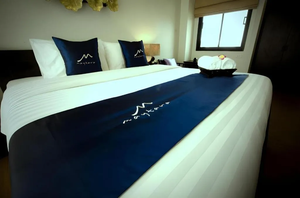 Bed in Maytara Hotel