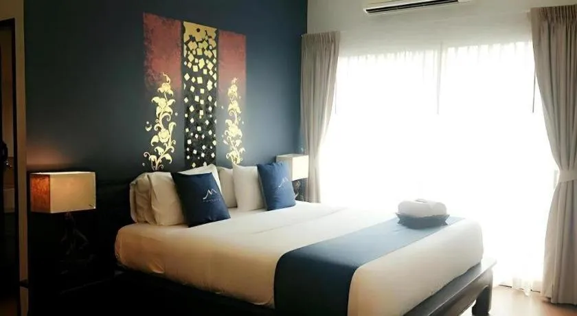 Bed in Maytara Hotel