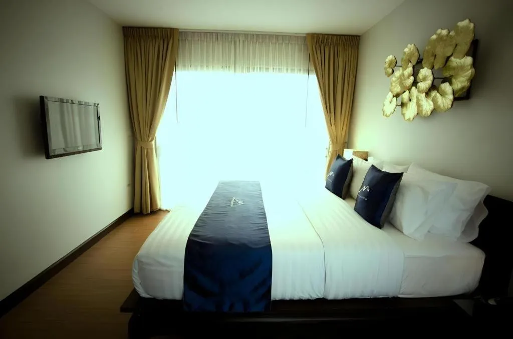 Bed in Maytara Hotel