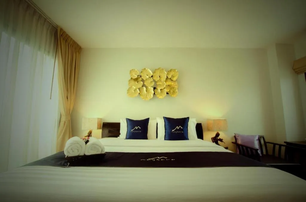 Bed in Maytara Hotel