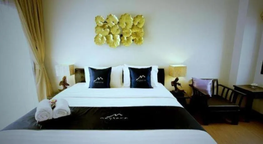 Bed in Maytara Hotel