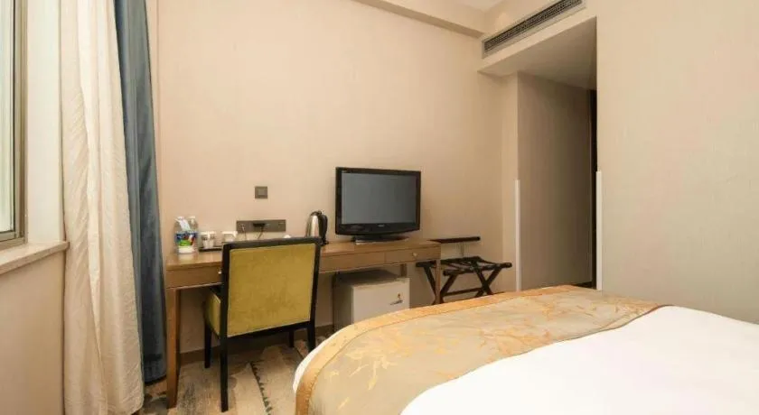 Bed in Zhangjiagang Guomao Hotel