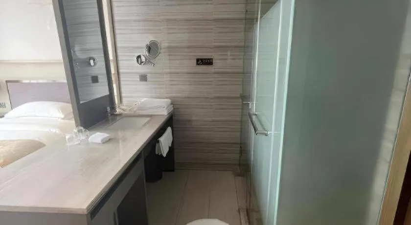 Bed in Zhangjiagang Guomao Hotel