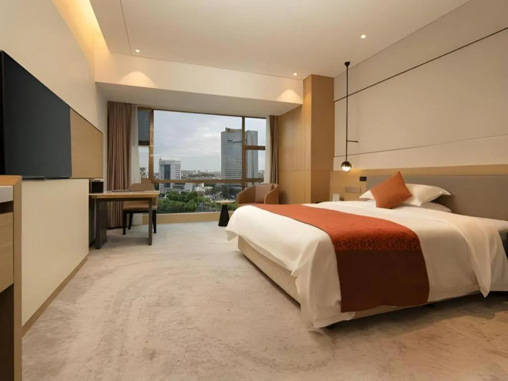 Bed in Zhangjiagang Guomao Hotel