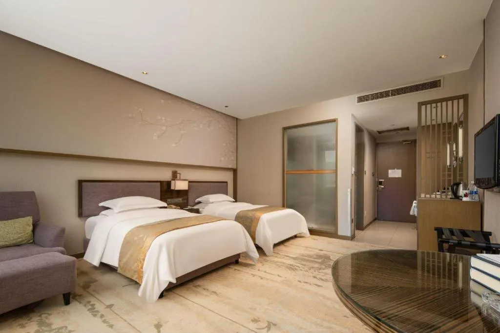 Bed in Zhangjiagang Guomao Hotel