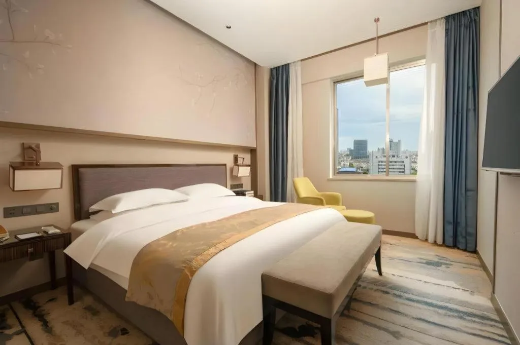 Bed in Zhangjiagang Guomao Hotel