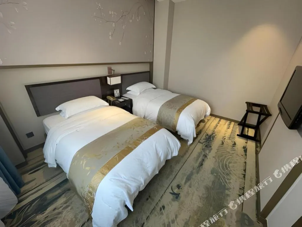 Bed in Zhangjiagang Guomao Hotel