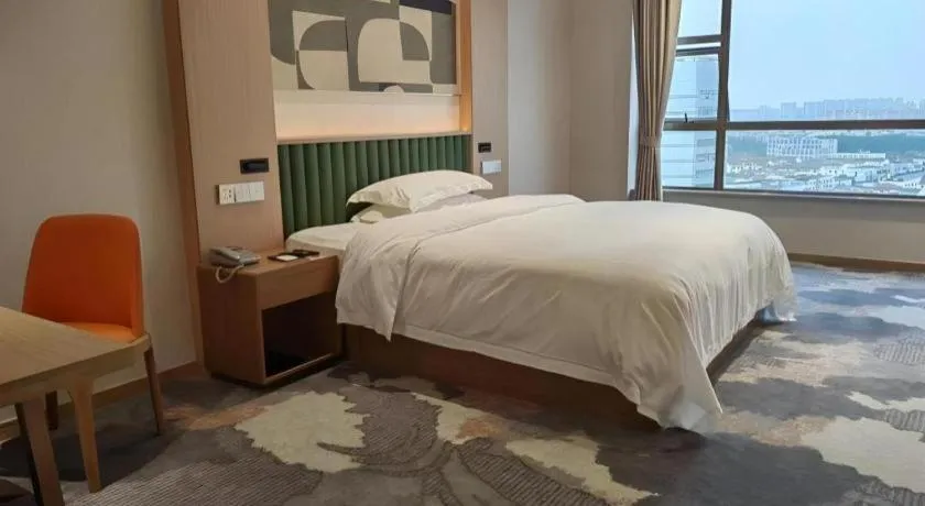 Bed in Zhangjiagang Guomao Hotel