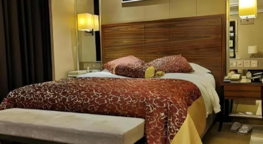 Bed in Zhangjiagang Guomao Hotel