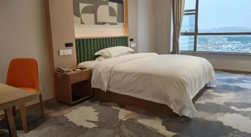 Bed in Zhangjiagang Guomao Hotel