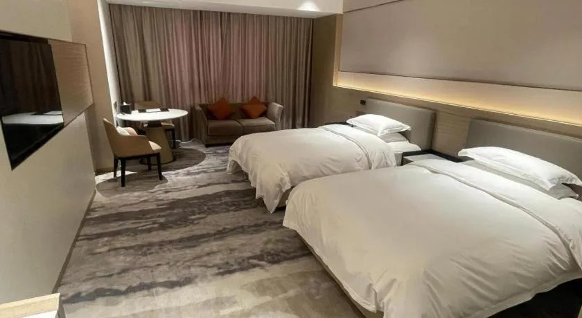 Bed in Zhangjiagang Guomao Hotel