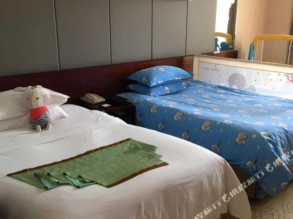 Bed in Zhangjiagang Guomao Hotel