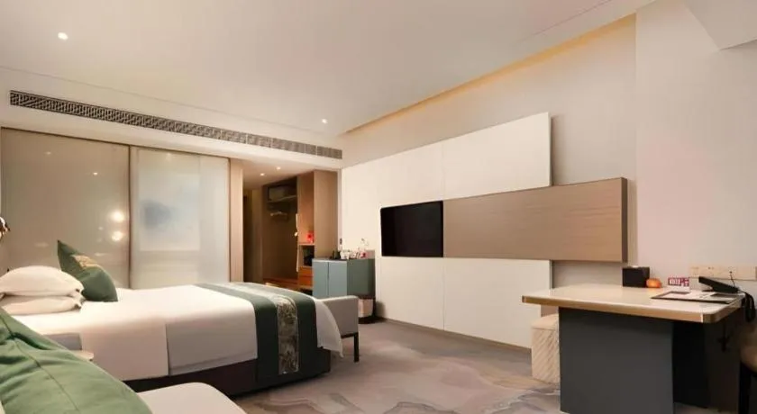 Bed in Zhangjiagang Guomao Hotel