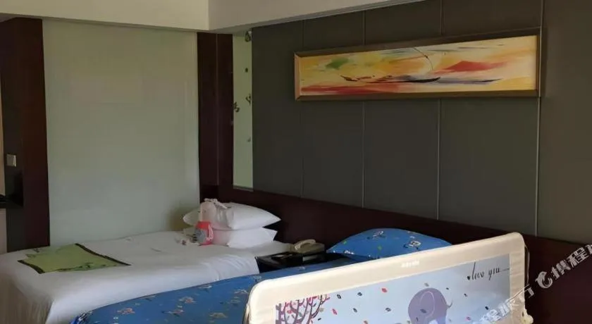 Bed in Zhangjiagang Guomao Hotel