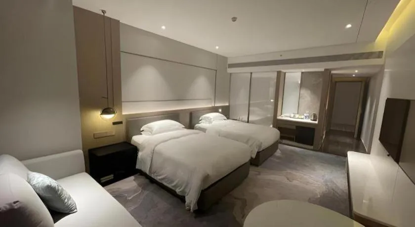 Bed in Zhangjiagang Guomao Hotel