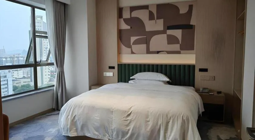 Bed in Zhangjiagang Guomao Hotel