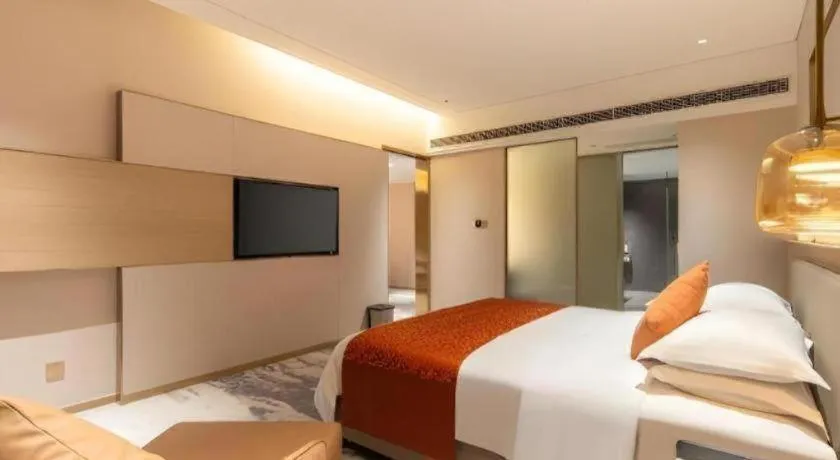 Bed in Zhangjiagang Guomao Hotel