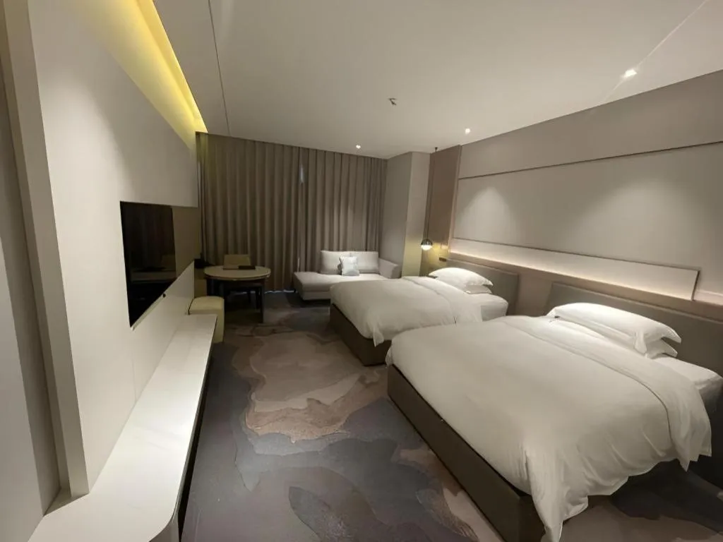 Bed in Zhangjiagang Guomao Hotel