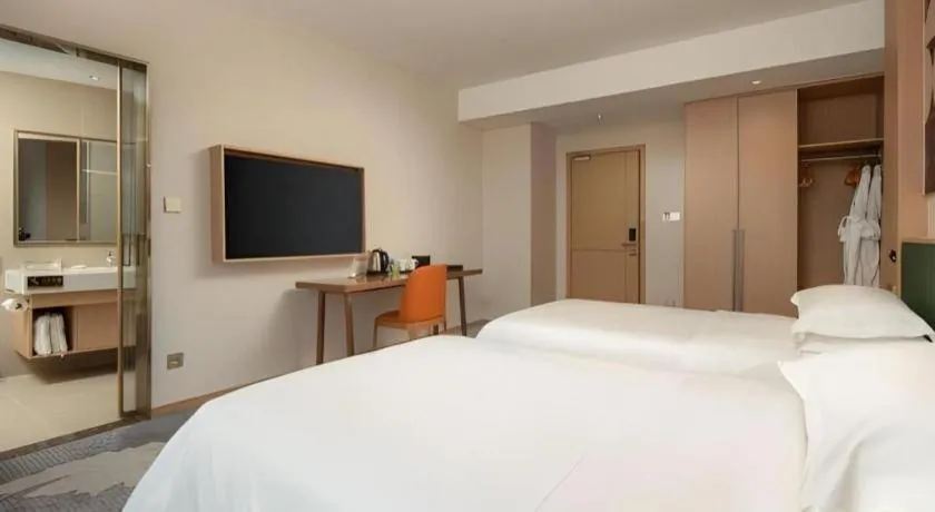 Bed in Zhangjiagang Guomao Hotel