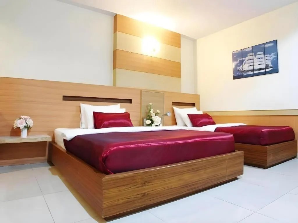 Bed in Amnauysuk Hotel