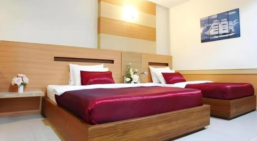 Bed in Amnauysuk Hotel