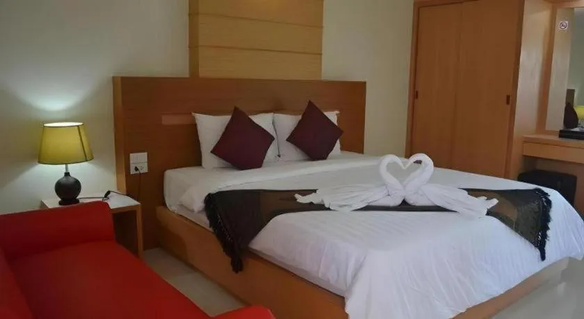 Bed in Amnauysuk Hotel