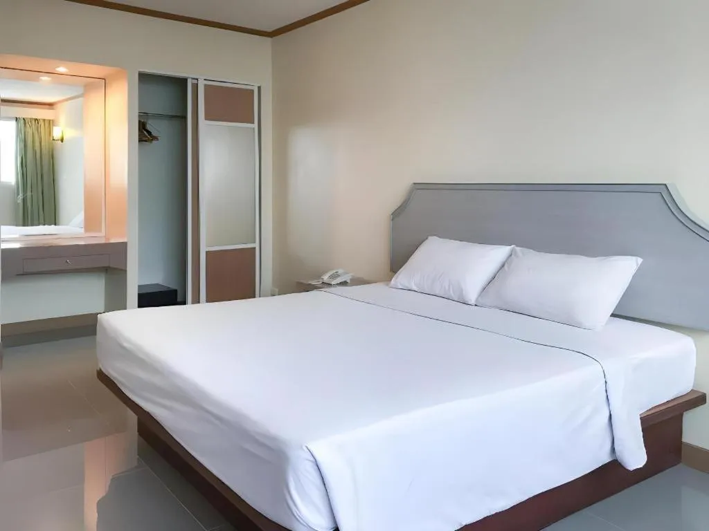 Bed in J Two S Pratunam Hotel