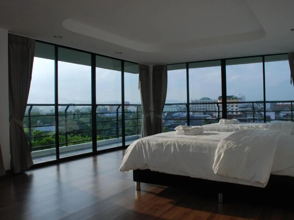 Bed in De Poem Loft Boutique Residence