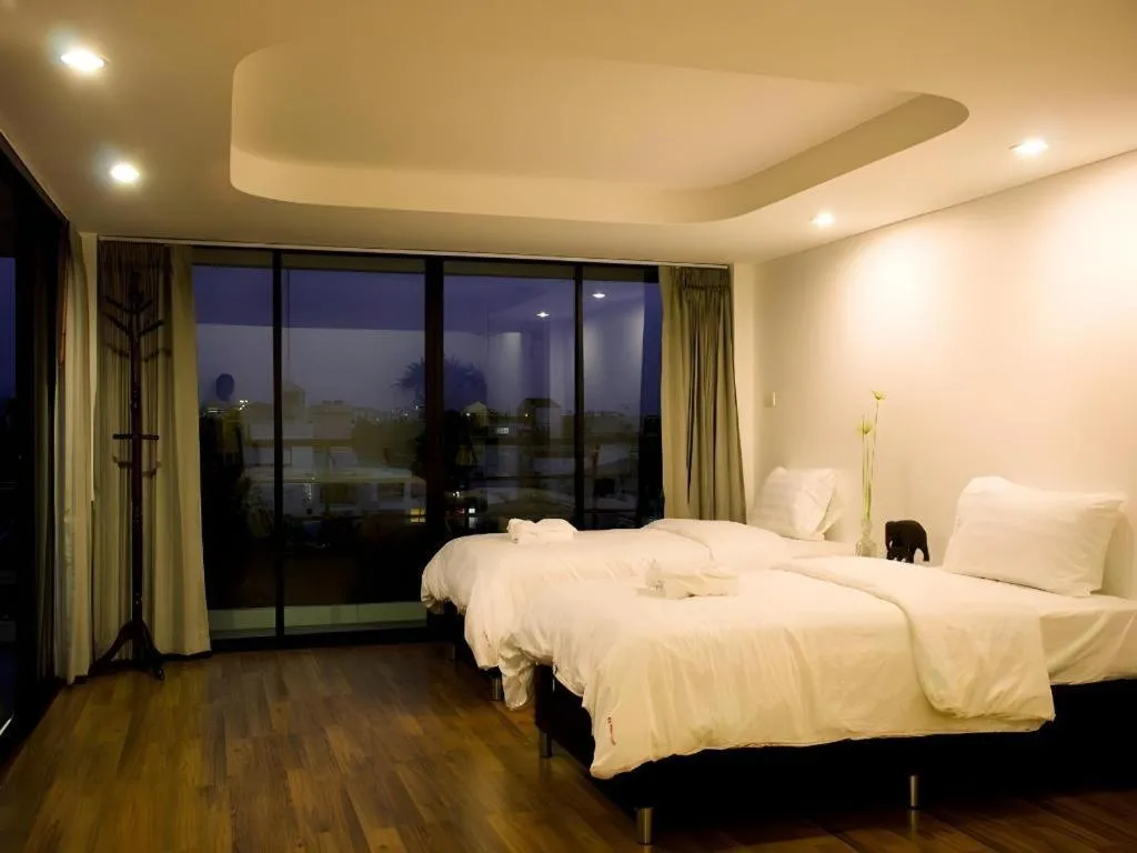 Bed in De Poem Loft Boutique Residence