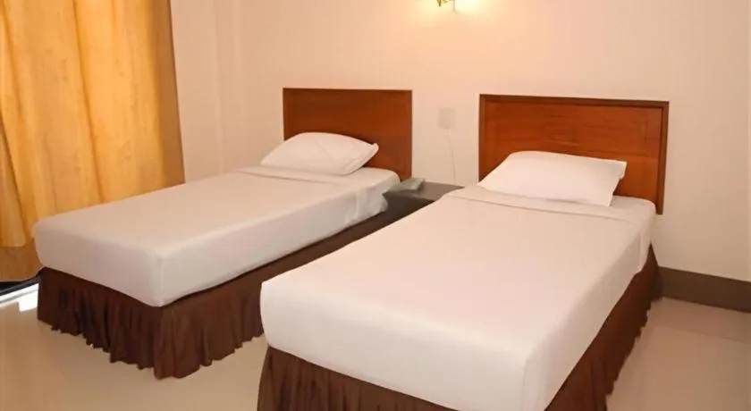 Bed in Chaleunehoung Hotel