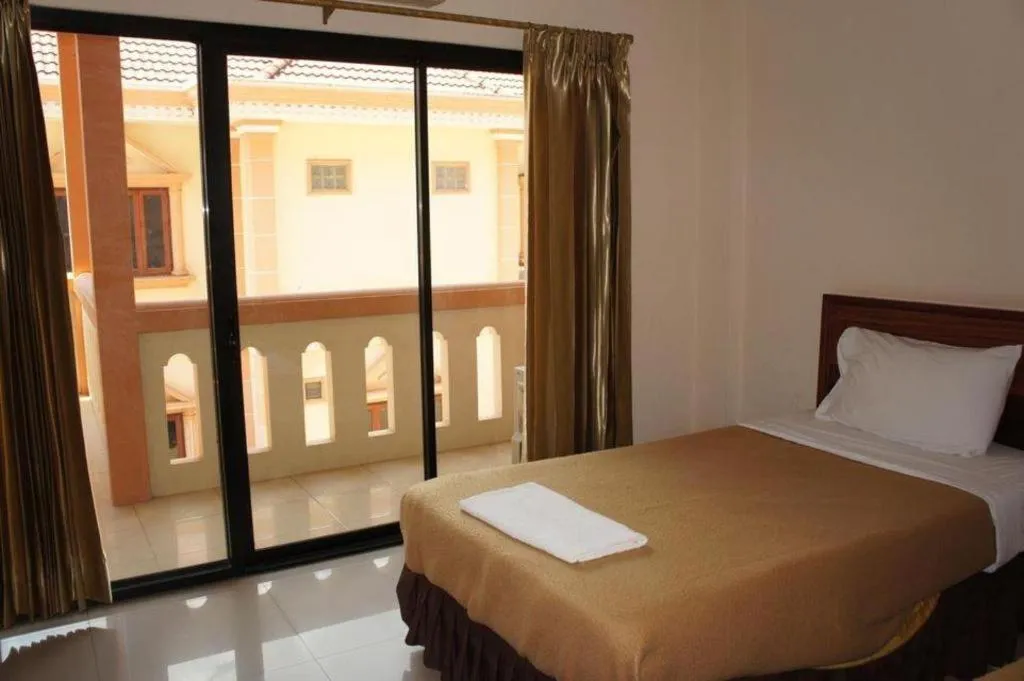 Bed in Chaleunehoung Hotel