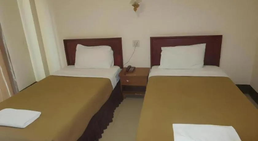 Bed in Chaleunehoung Hotel