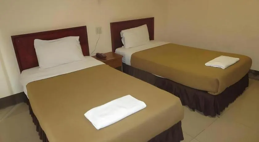 Bed in Chaleunehoung Hotel