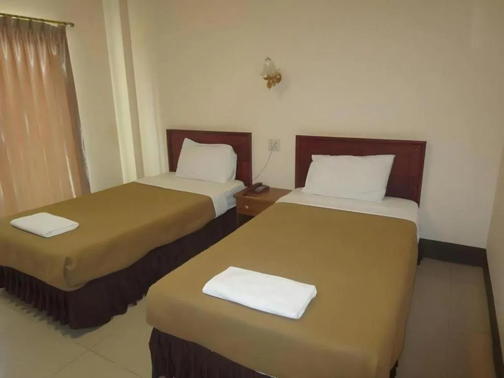 Bed in Chaleunehoung Hotel