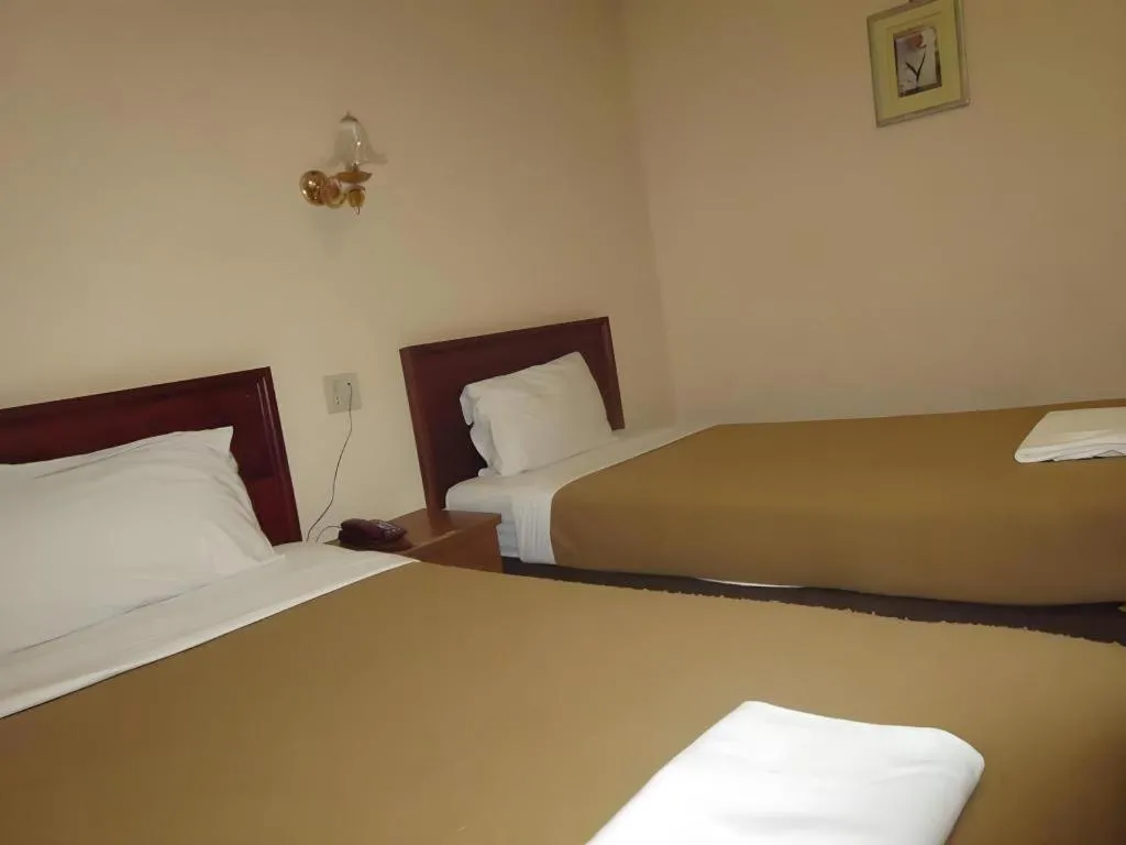 Bed in Chaleunehoung Hotel