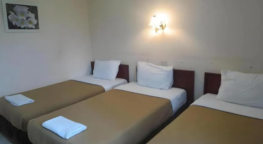 Bed in Chaleunehoung Hotel