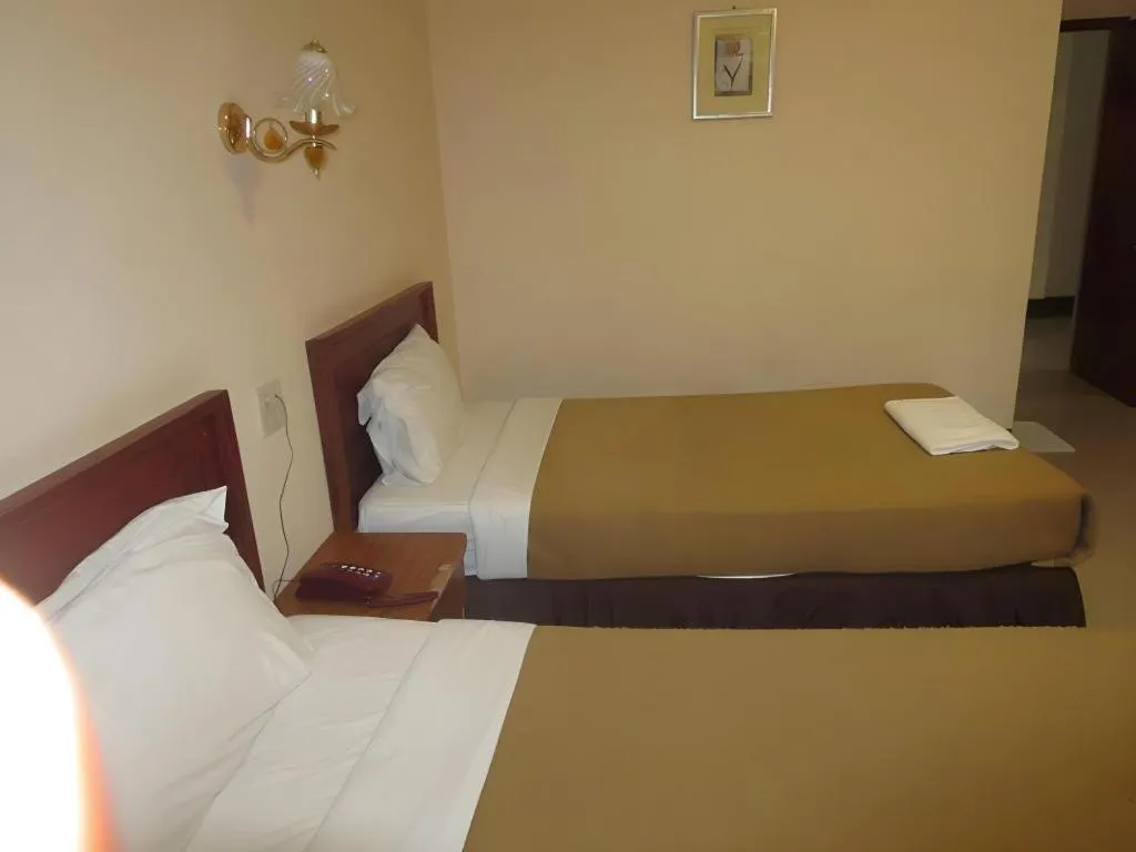 Bed in Chaleunehoung Hotel