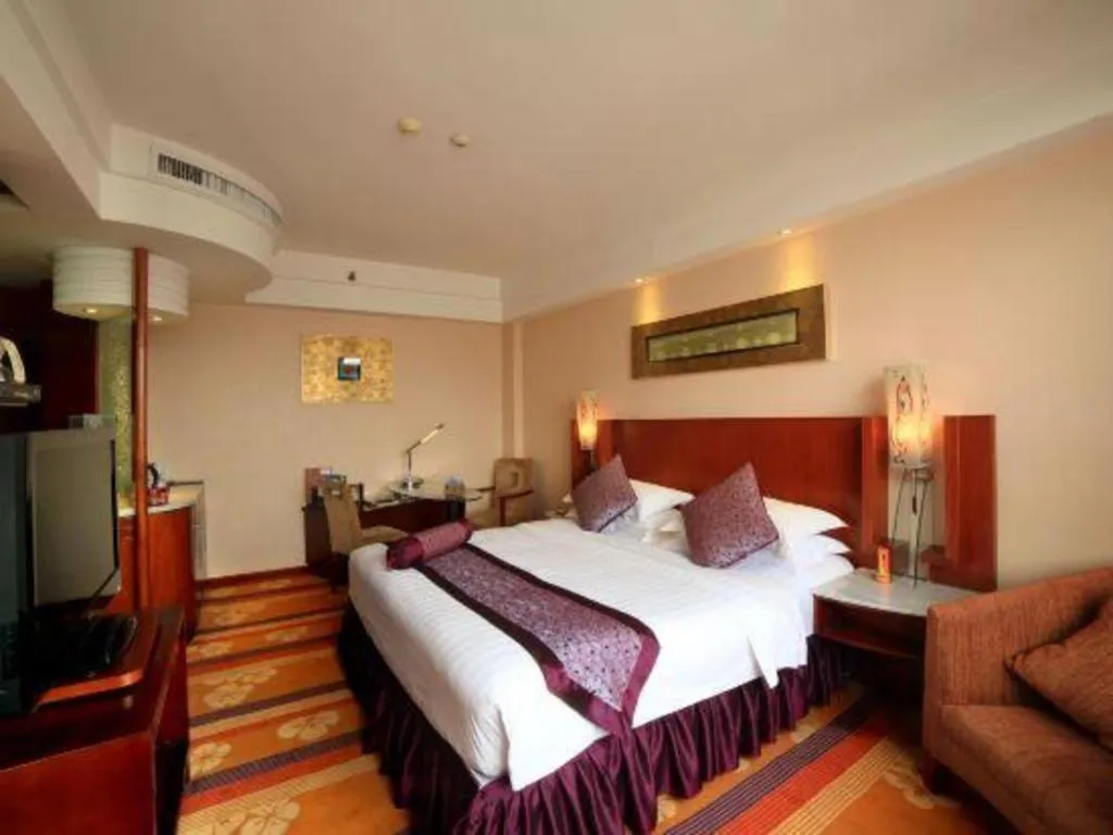 Bed in Gem Flower Jinyu Sunshine Hotel