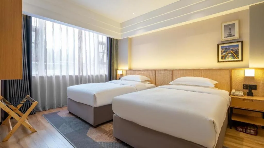 Bed in Gem Flower Jinyu Sunshine Hotel