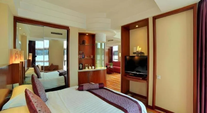 Bed in Gem Flower Jinyu Sunshine Hotel