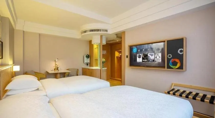 Bed in Gem Flower Jinyu Sunshine Hotel