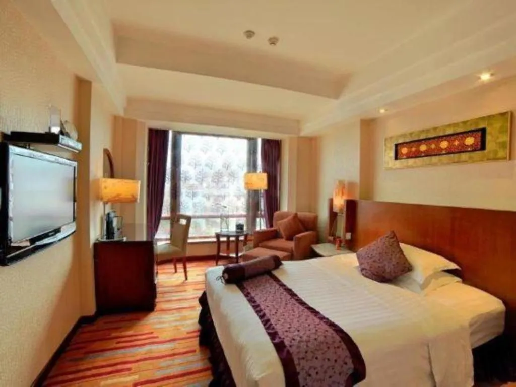 Bed in Gem Flower Jinyu Sunshine Hotel