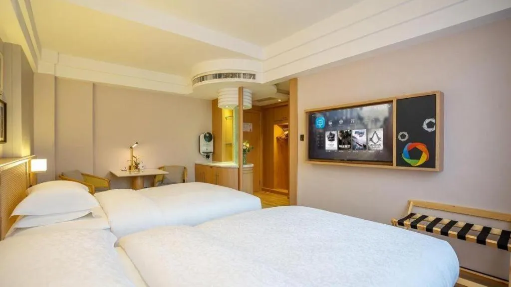 Bed in Gem Flower Jinyu Sunshine Hotel