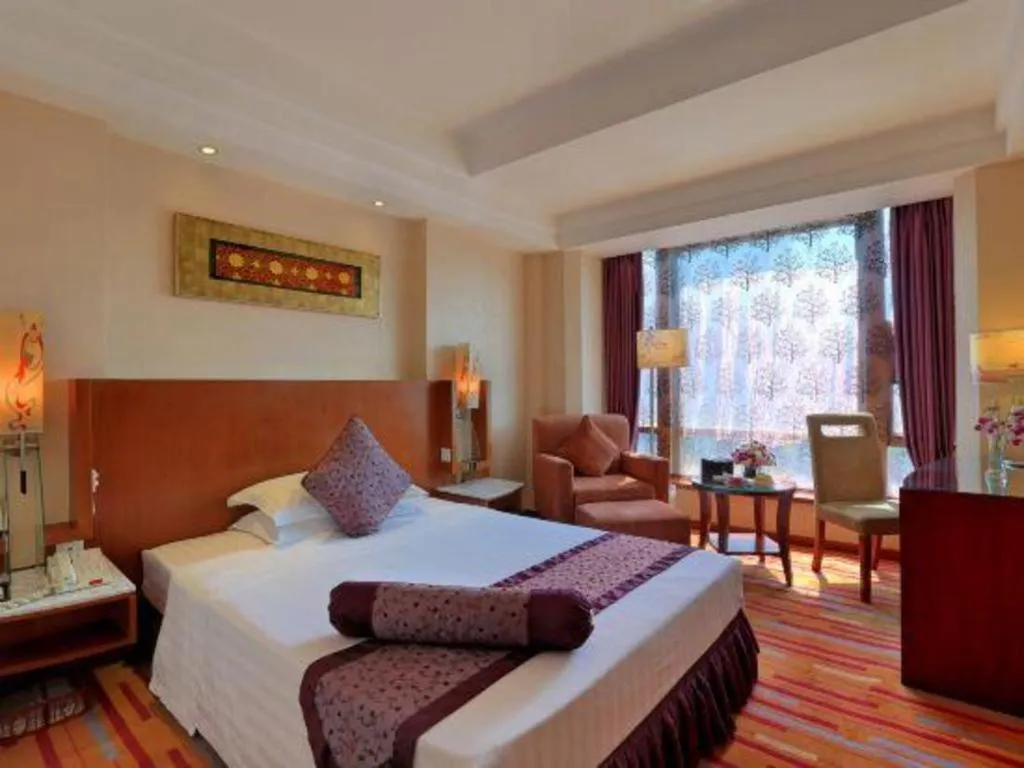 Bed in Gem Flower Jinyu Sunshine Hotel