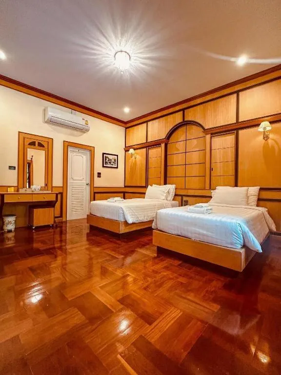 Bed in Siam River Resort