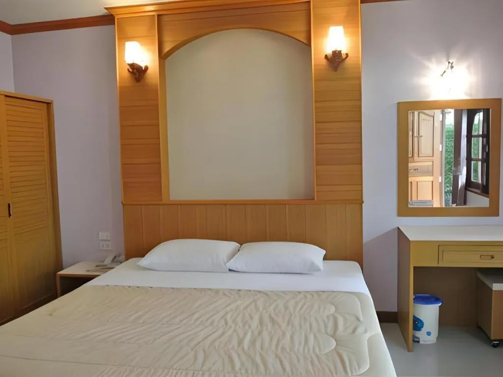 Bed in Baan Ingna Resort Hotel