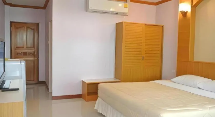 Bed in Baan Ingna Resort Hotel