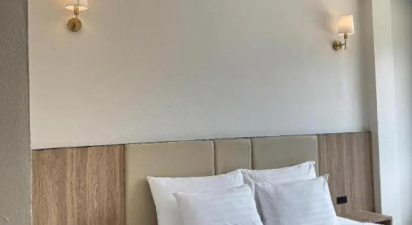 Bed in Baan Ingna Resort Hotel