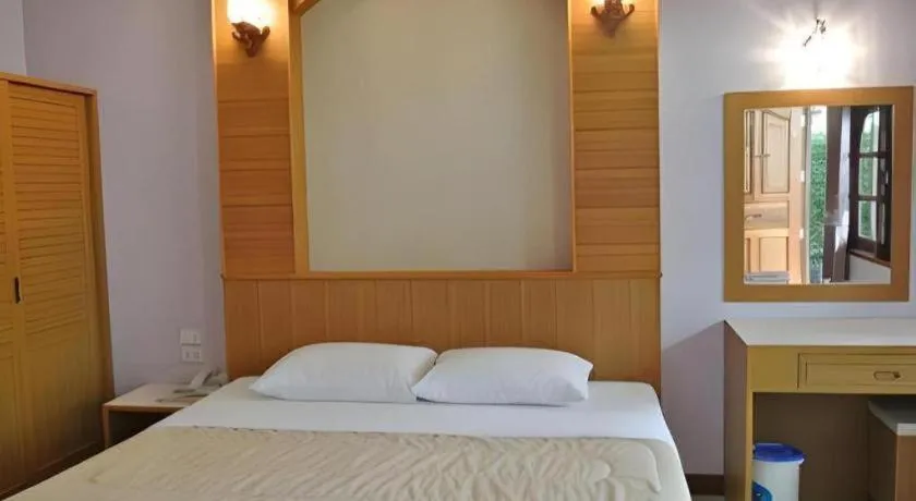 Bed in Baan Ingna Resort Hotel